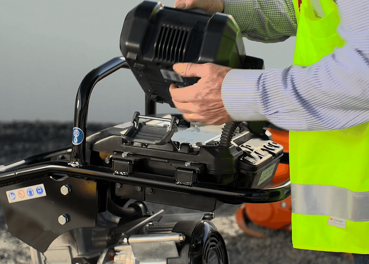 Worker operating battery plate reverse plate